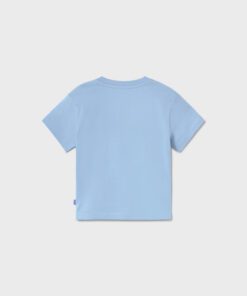 Light blue short sleeve T shirt shown from the back on a neutral background