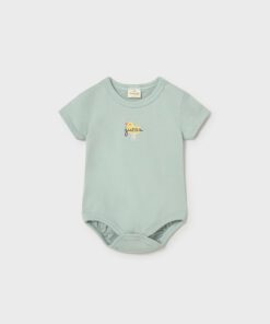 Mint green baby onesie with short sleeves and a small yellow chick logo reading juego on the chest The garment is simple and pastel toned for infants
