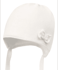 White knitted baby hat with ear flaps, ties, and a small side bow.