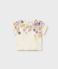 Cream short-sleeve kids' top with a pastel floral print across the upper front and subtle bee motifs.