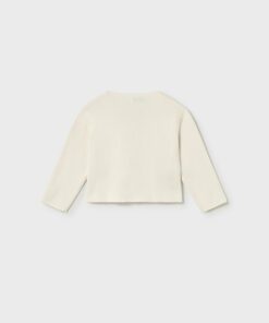 Back view of a cream colored cropped knit sweater on a light gray background