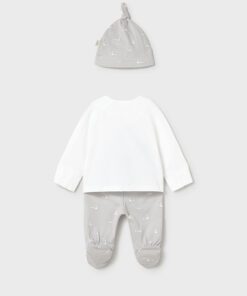 Baby clothing set laid out white long sleeve top gray dotted pants with built in feet and a matching gray hat with a knot
