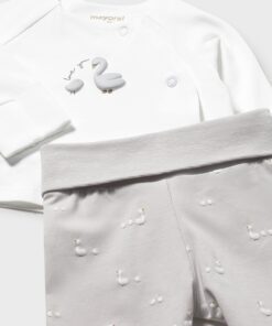 White kids sweatshirt with a gray swan appliqué and a matching light gray pants set featuring small swan motifs and a ribbed waistband