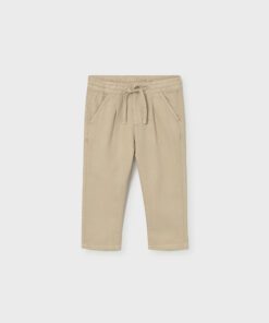 Beige toddler pants with an elastic waistband and drawstring featuring front pockets