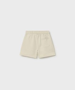 Back view of beige shorts with an elastic waistband and one back pocket
