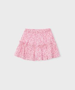 Pink floral girls skirt with an elastic waist and tiered ruffle design on a light gray background displayed flat