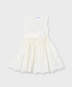White sleeveless dress for girls with a floral sash and lace trim hem to the knee  or below the knee length